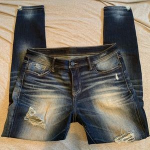 Buckle black skinny moto jeans